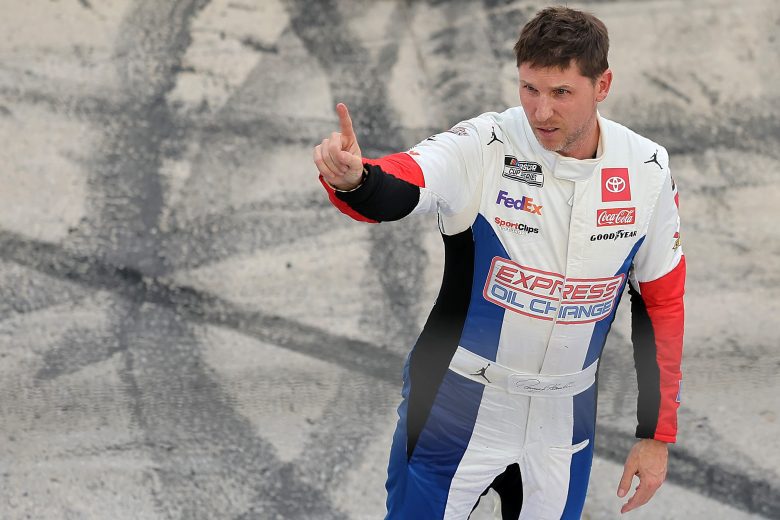 Denny Hamlin celebrates on track