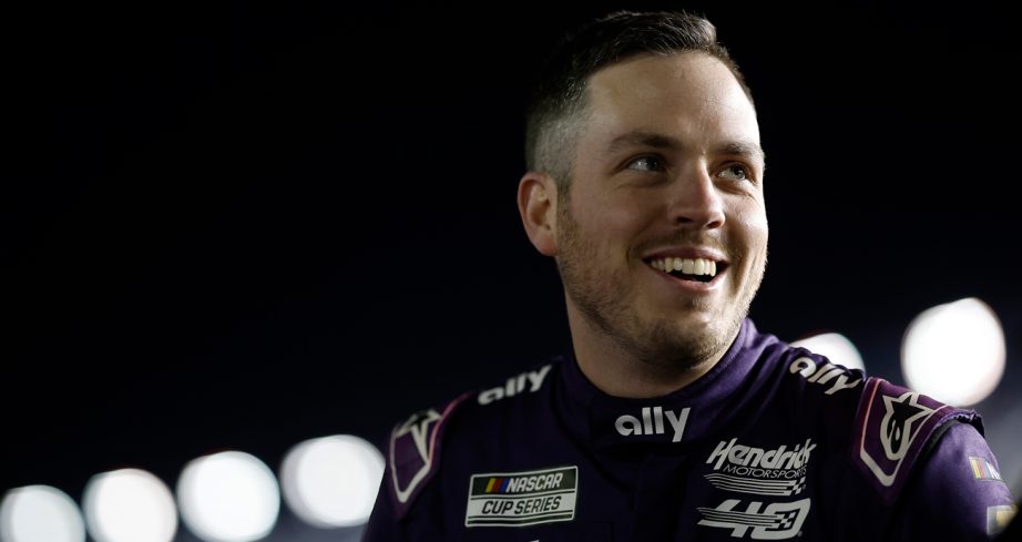 Alex Bowman smiles on pit road.