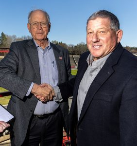 NASCAR Chairman & CEO Jim France and Bowman Gray promoter Gray Garrison shake hands