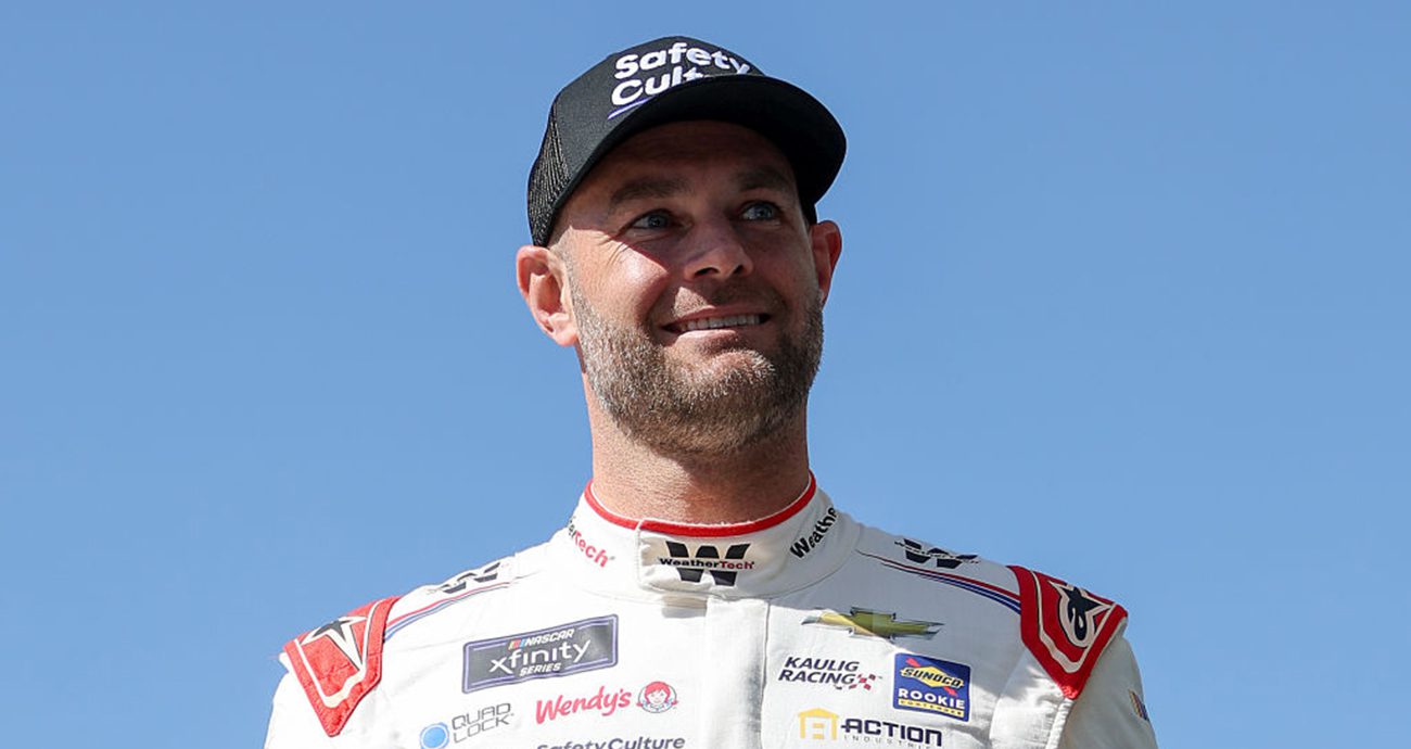 Shane van Gisbergen looks on