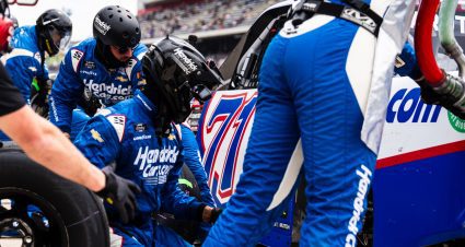 Pit crew members service the No. 71 truck during a NASCAR race at COTA.