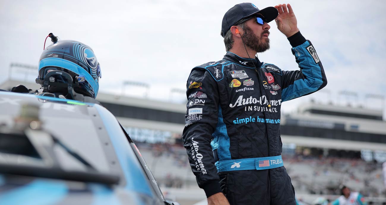 Martin Truex Jr. looks on before a NASCAR Cup Series race.