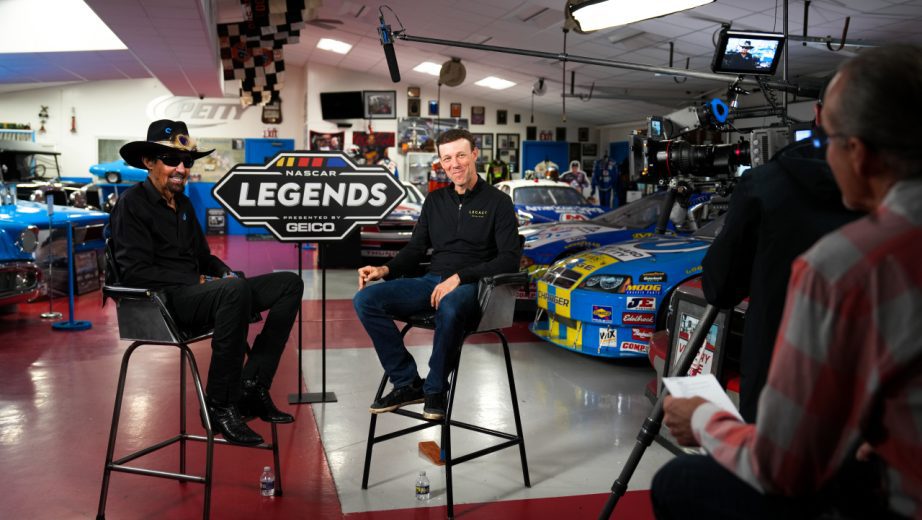 Lee Petty sits in the foreground as he interviews Richard Petty (left) and Matt Kenseth (right) during a video shoot.