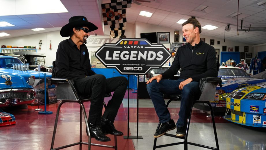 Richard Petty (left) and Matt Kenseth (right) sit and chat during a video shoot.