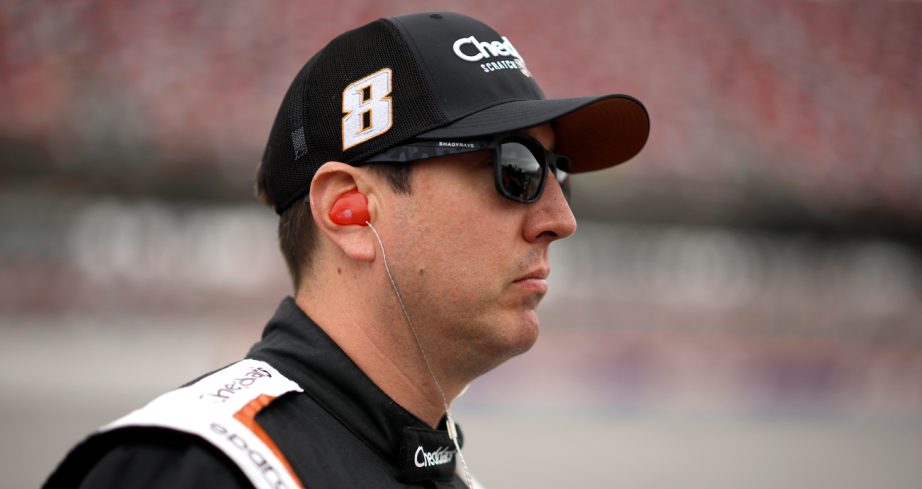 Kyle Busch stands on pit road at Talladega Superspeedway.