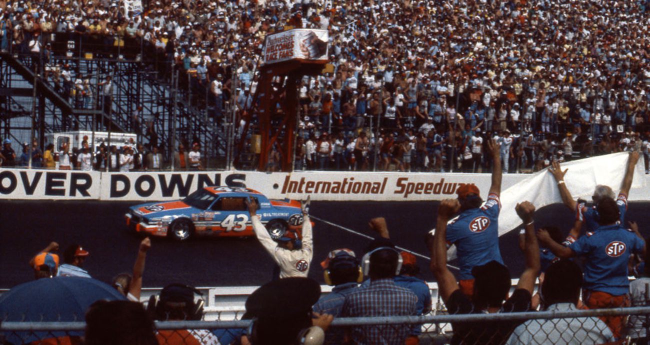 Richard Petty takes the checkered flag at Dover