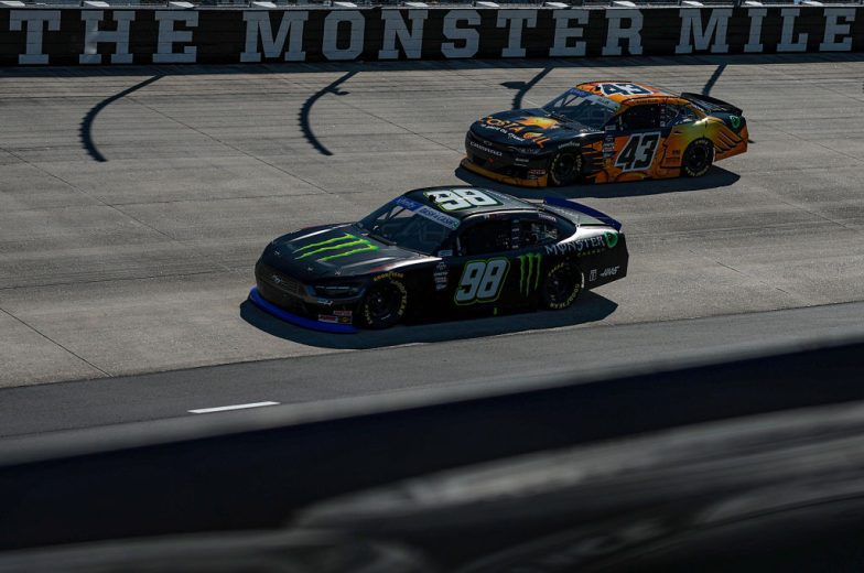 Riley Herbst and Ryan Ellis drive at Dover.