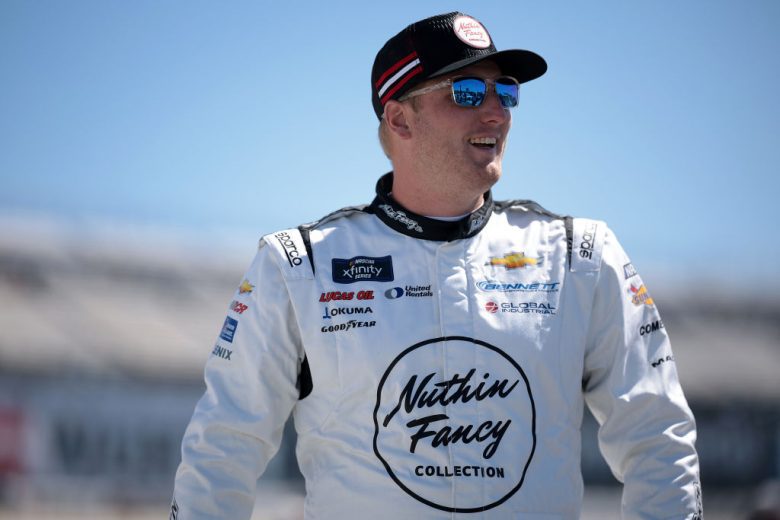 Austin Hill drives at Dover.