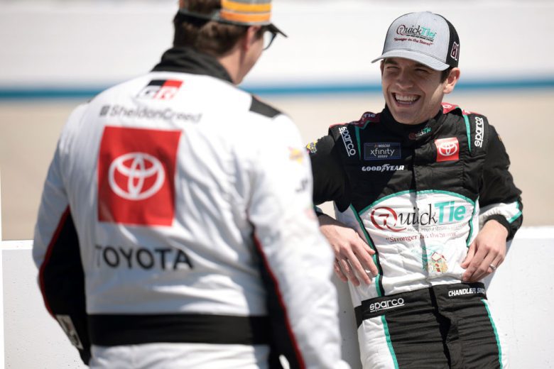 Sheldon Creed and Chandler Smith chat at Dover.