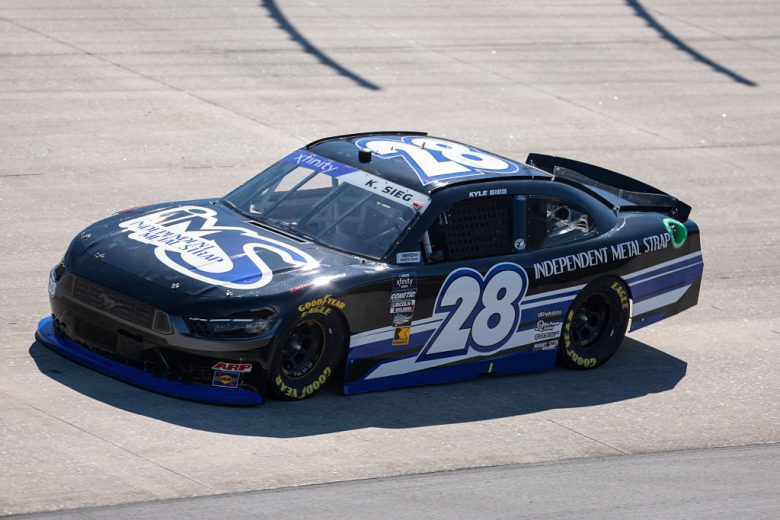 Kyle Sieg drives at Dover.