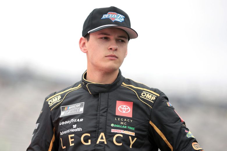 Corey Heim looks on at Dover.