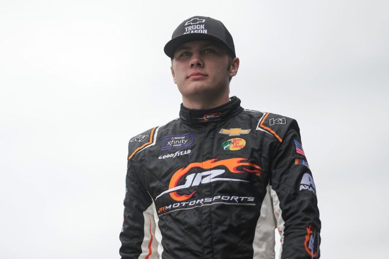 Carson Kvapil looks on at Dover.