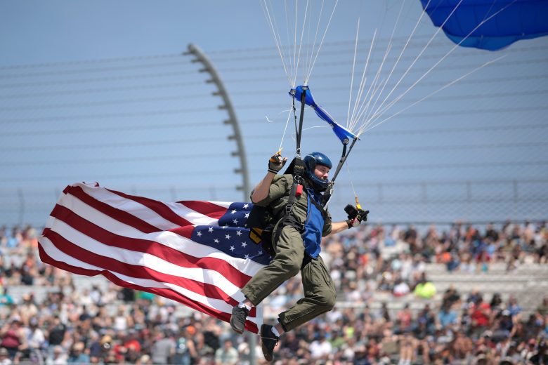 Parachuter lands with the American flag