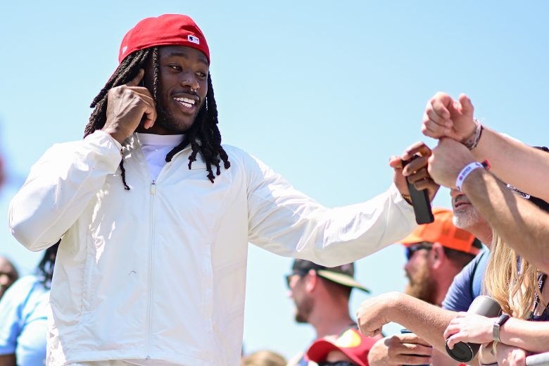 Alvin Kamara high fives fans at Dover
