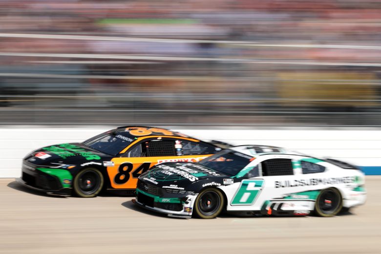 Brad Keselowski races Jimmie Johnson