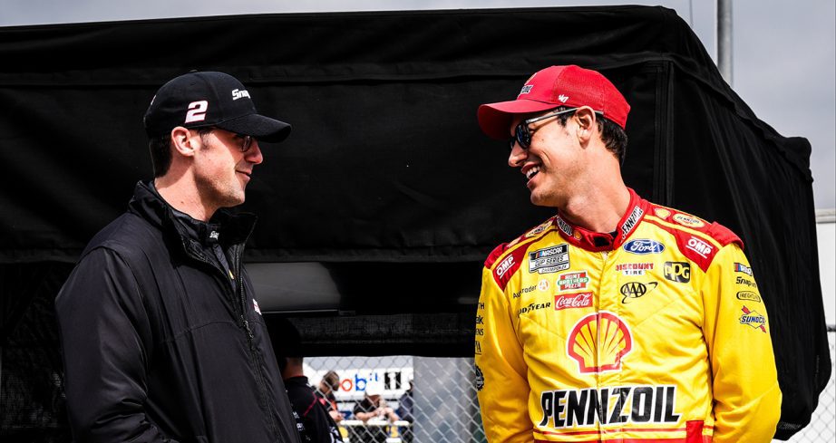 Cindric and Logano talk on pit road