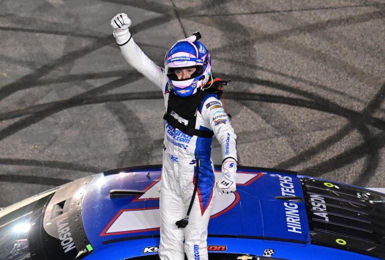 Kyle Larson, driver of the No. 5 HendrickCars.com Chevrolet, celebrates after winning the NASCAR Cup Series AdventHealth 400 at Kansas Speedway.