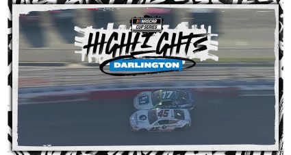 Tyler Reddick, Chris Buescher make late contact battling for lead