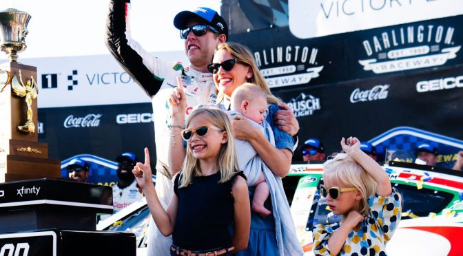 Featured Image for Scarlett Keselowski celebrates dad Brad’s win, takes American flag to school