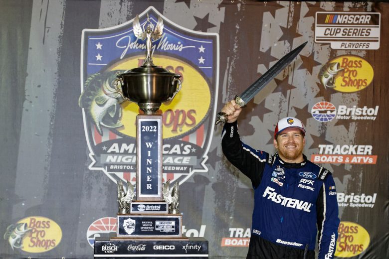 Chris Buescher raises a sword in Victory Lane following his NASCAR Cup Series victory at Bristol Motor Speedway.