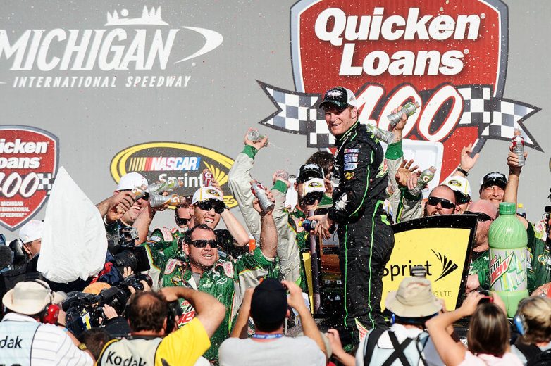 Dale Earnhardt Jr. celebrates in Victory Lane at Michigan International Speedway.