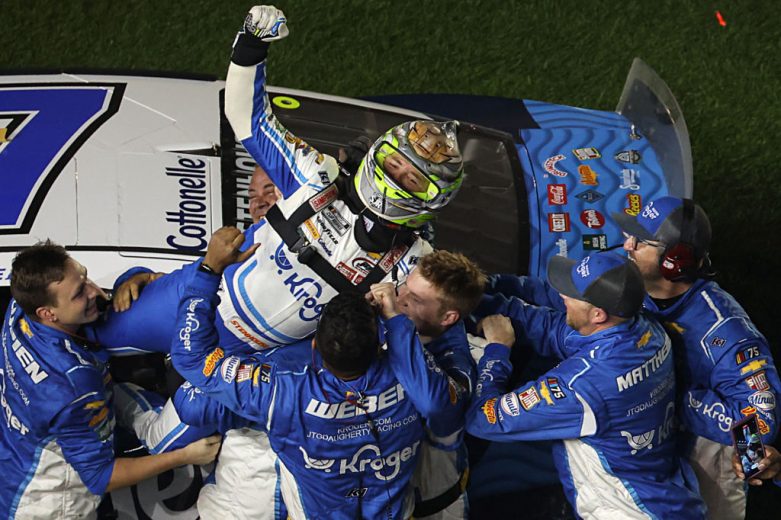 Ricky Stenhouse Jr. is picked up by his pit crew following his NASCAR Cup Series victory at Daytona International Speedway.