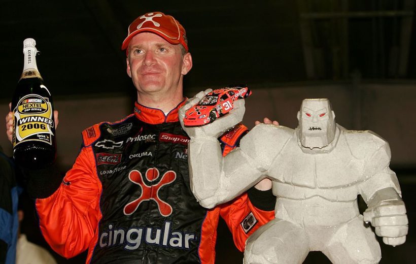 Jeff Burton poses for a photo following his NASCAR Cup Series victory at Dover Motor Speedway.