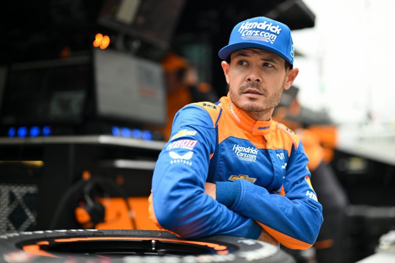 Kyle Larson looks on.