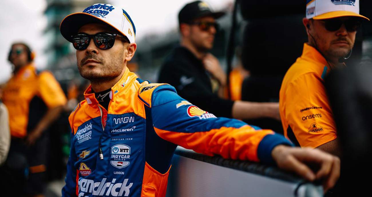 Kyle Larson looks on during qualifying at Indianapolis Motor Speedway