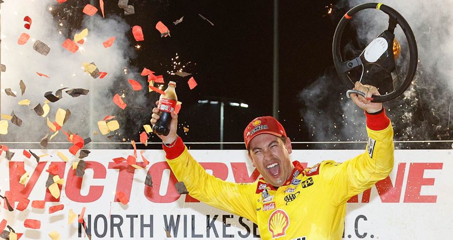 Joey Logano celebrates in Victory Lane at North Wilkesboro Speedway following his NASCAR Cup Series All-Star Race win at North Wilkesboro Speedway.