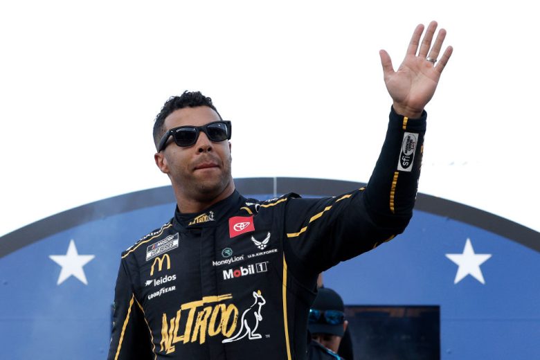 Bubba Wallace waves to fans