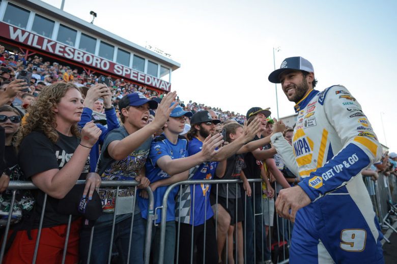 Chase Elliott high fives fans