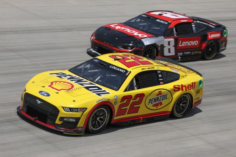 Logano and Busch race at Dover