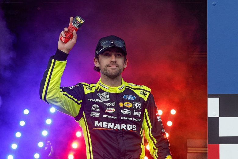 ryan blaney waves to fans