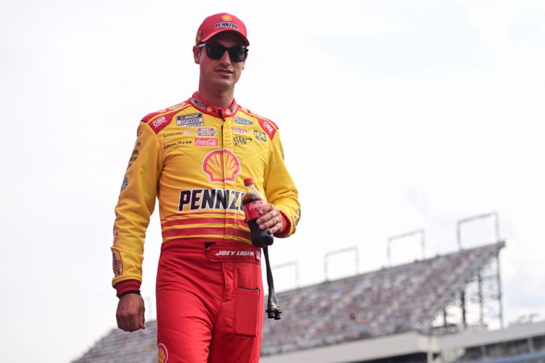 Joey Logano looks on