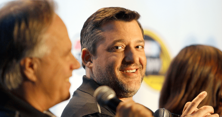 Tony Stewart looks on from press conference.