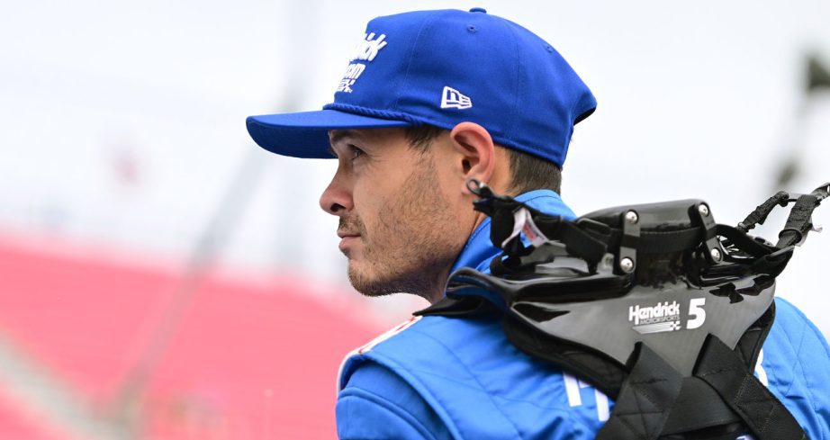 Kyle Larson, driver of the No. 5 HendrickCars.com Chevrolet, enters his car during qualifying for the NASCAR Cup Series Enjoy Illinois 300 at WWT Raceway on June 1, 2024 in Madison, Illinois.