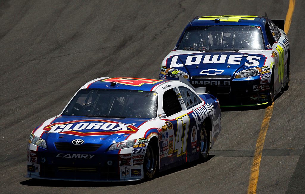 Marcos Ambrose and Jimmie Johnson race at Sonoma.