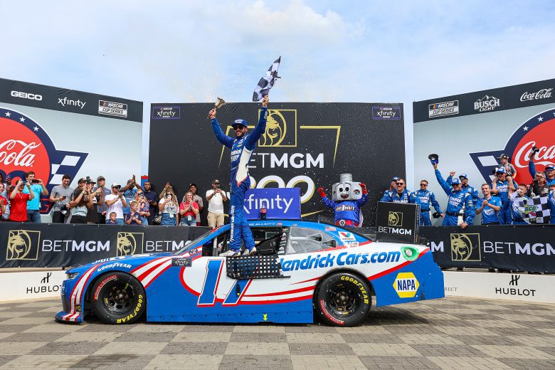 Chase Elliott celebrates a win at Charlotte Motor Speedway.
