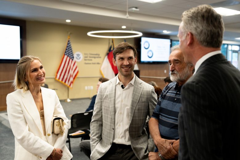 Daniel Suárez talks with NASCAR President Steve Phelps.