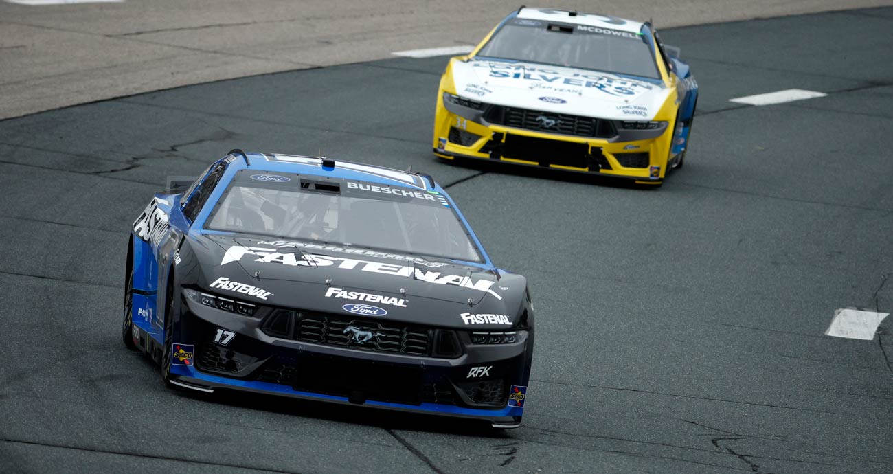 Chris Buescher, in the No. 17 Ford, races ahead of Michael McDowell in the No. 34 Ford at New Hampshire Motor Speedway.