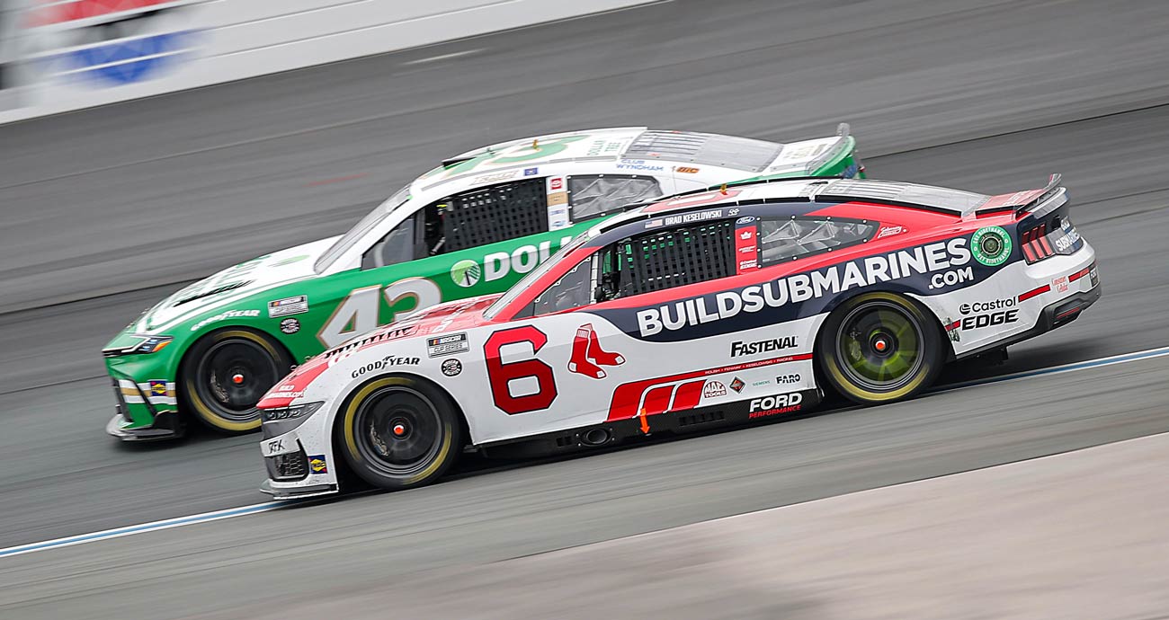 Brad Keselowski, in the No. 6 Ford, races next to Erik Jones in the No. 43 Toyota at New Hampshire Motor Speedway.