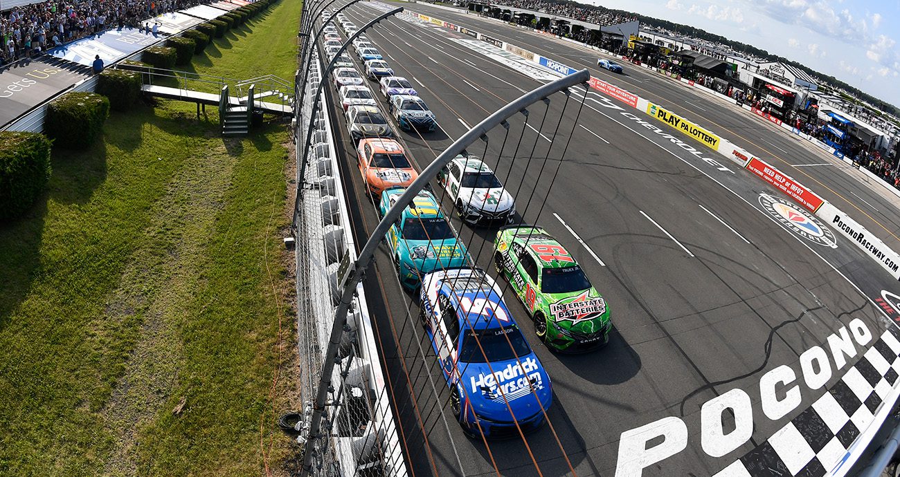 cars take the green flag at pocono
