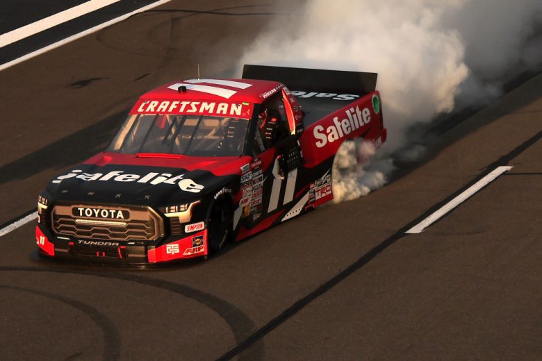 Corey Heim does a burnout after winning at Pocono.