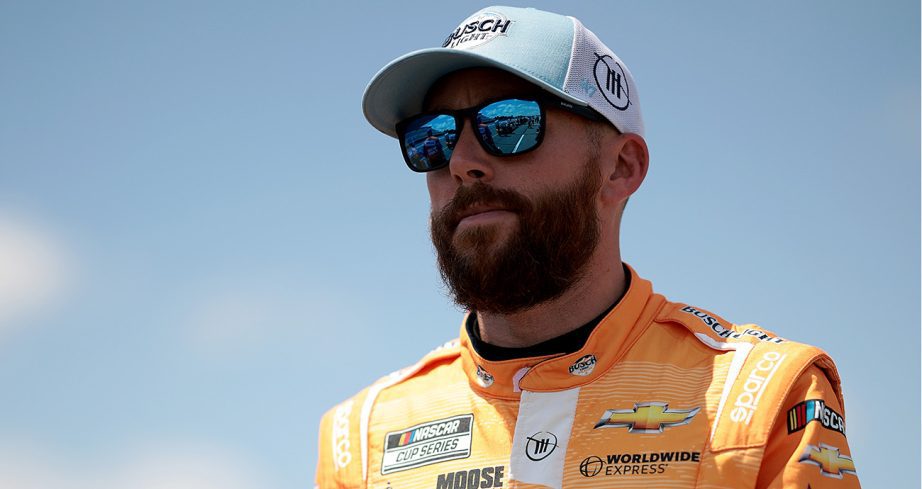 Ross chastain looks on.