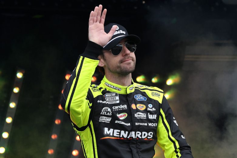 Ryan Blaney waves to the crowd before a NASCAR Cup Series race.