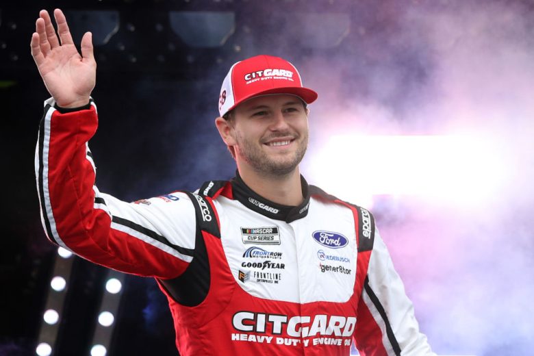 Todd Gilliland waves to the crowd before a NASCAR Cup Series race.
