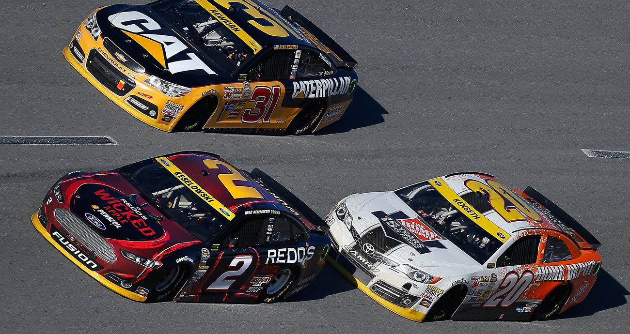 Matt Kenseth gives Brad Keselowski an aerodynamic push during the 2014 playoff race at Talladega Superspeedway.