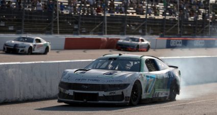 Chris Buescher drives down pit road at Darlington.