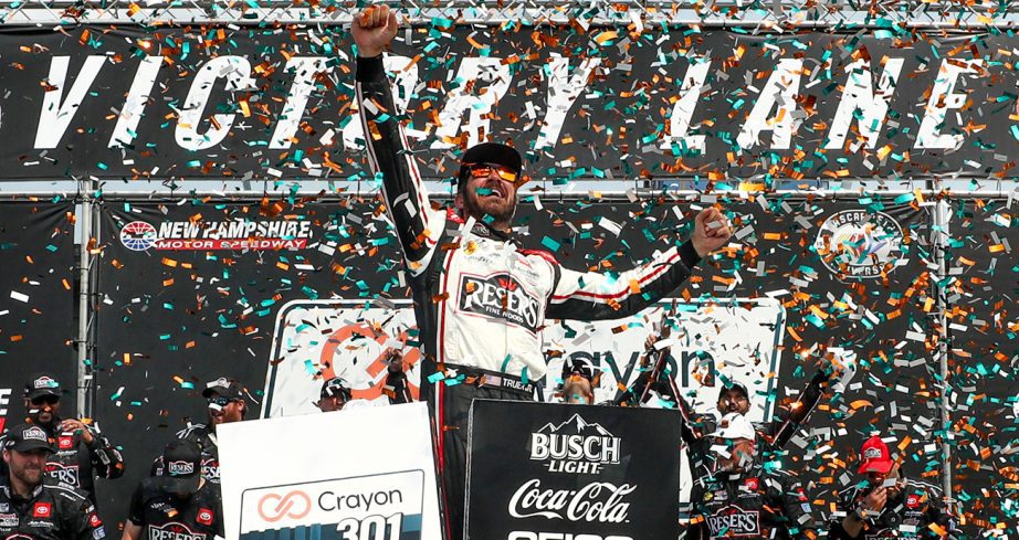 Martin Truex Jr. celebrates in Victory Lane.